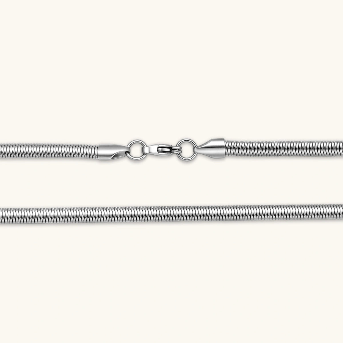 Two-tone twisted necklace with interlocked gold and silver ribbed snake chains, 6mm wide, on a white background.